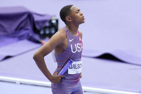 Teen sprinter Quincy Wilson's 1st race at Olympics a learning experience, US advances in 4x400 relay