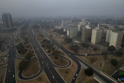 In a rare event, fire smoke covers Brazil's capital, prompting federal response