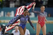 Simone Biles edges Brazil's Rebeca Andrade for her second Olympic all-around gymnastics title