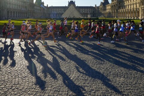 Sifan Hassan wins women's marathon at Paris Olympics after trading elbows with Tigst Assefa