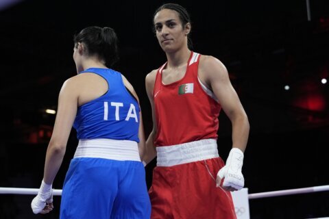 Imane Khelif, Algeria boxer who had gender test issue, wins first Olympic fight when opponent quits