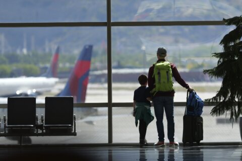 Proposed rule would ban airlines from charging parents to sit with their children