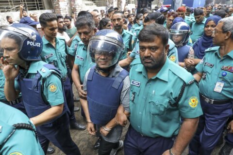 Bangladesh court sends 2 journalists to police custody for questioning as chaos continues