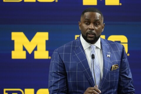 Michigan’s Moore faces allegations of NCAA violations in sign-stealing investigation, AP sources say