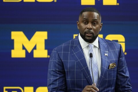 Michigan's Moore faces allegations of NCAA violations in sign-stealing investigation, AP sources say