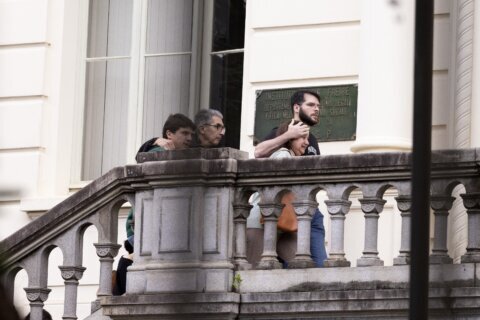 Families of Brazilian plane crash victims gather in Sao Paulo as French experts join probe