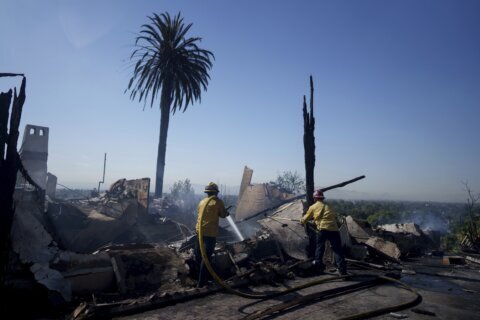 Fast-moving Southern California wildfire torches hillside homes, forcing evacuations