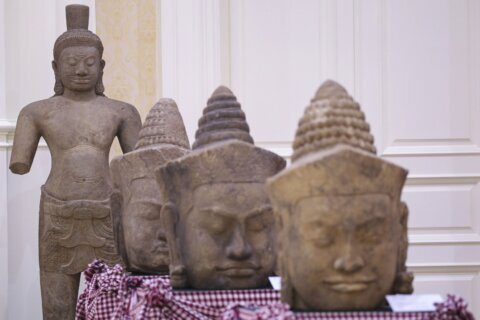 Cambodia's prime minister welcomes artifacts returned by New York's Met and other collections