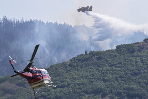 Firefighters continue battling massive wildfire in California ahead of thunderstorms, lightning