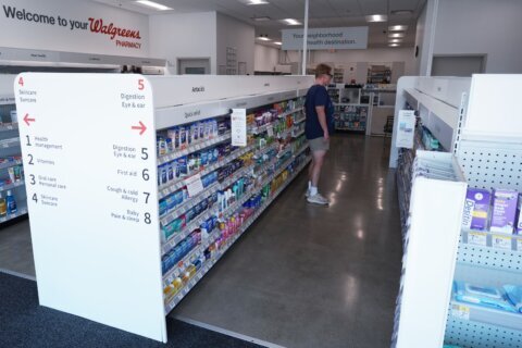 Drugstores tinker with new looks as their usual way of doing business faces challenges