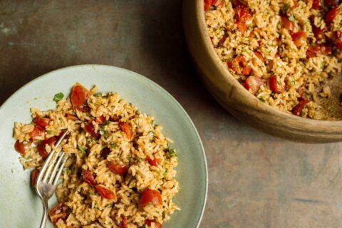 Fresh tomatoes and tomato paste impart deep flavor in this comforting Indian rice dish