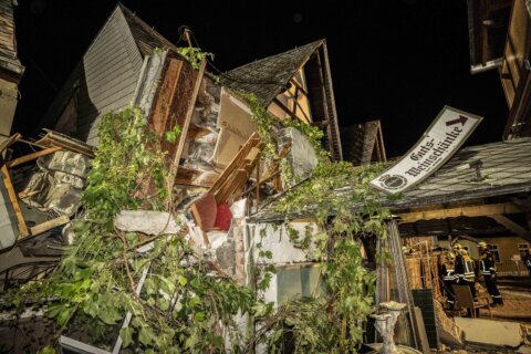 Part of a hotel on Germany’s Mosel River collapses, killing 2 and trapping others for hours