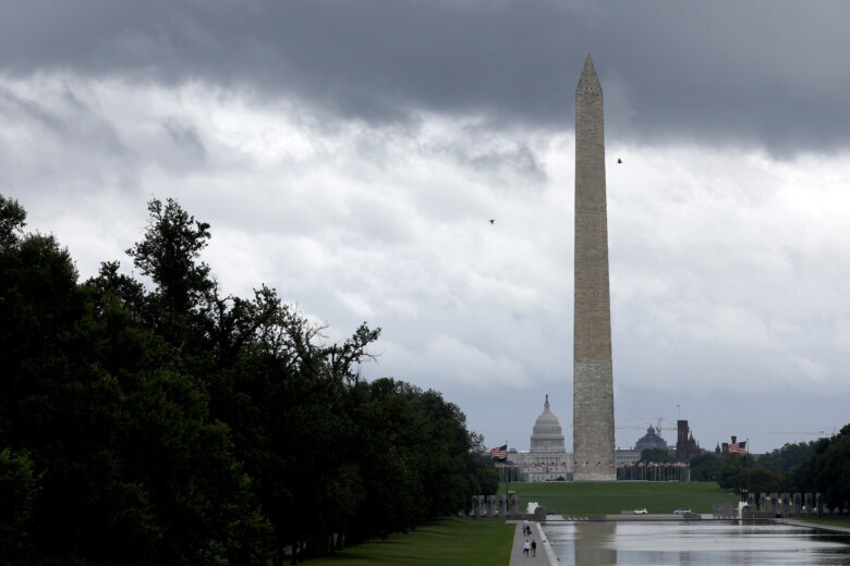 Rain clouds hang over the National Mall