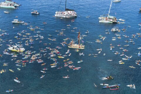 Maui remembers the 102 lost in the Lahaina wildfire with a paddle out 1 year after devastating blaze