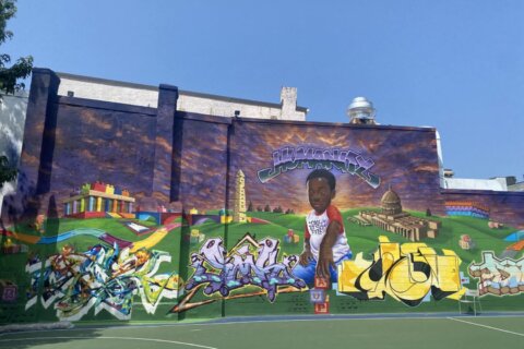 DC graffiti mural meant to promote 'humanity' now at the center of legal fight