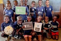 kids in zambia wearing donated jerseys