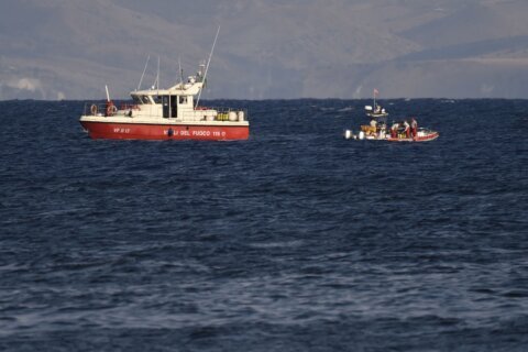 Divers recover 5 bodies from wrecked superyacht off Sicily; 1 still missing