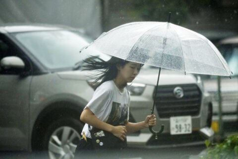 Storm Shanshan slowly moves across Japan as officials warn of torrential rains in major cities