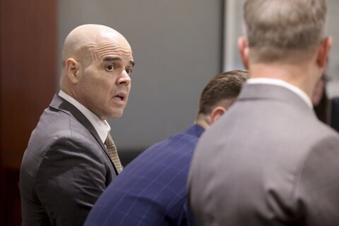 Key police testimony caps first week of ex-politician's trial in Las Vegas reporter's death