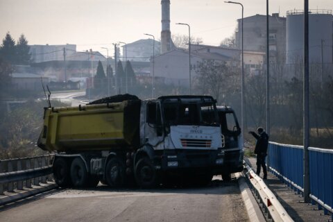 Kosovo's premier calls for full reopening of key bridge in flashpoint city. But the West is wary