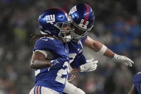 Gray runs for 2 touchdowns as the Giants beat the Lions 14-3 in a preseason game with few starters