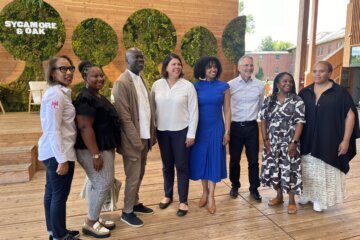 a group of people pose for a photo