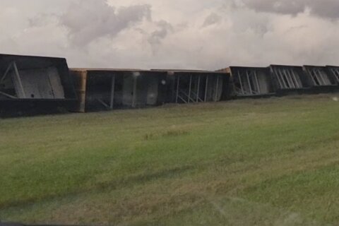 High winds, possibly from a tornado, derail 43 train cars in North Dakota