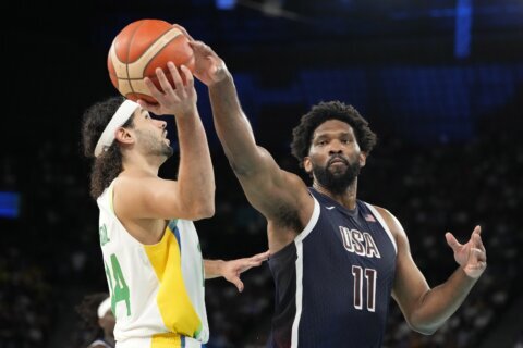 US rolls into semifinals of Paris Olympic basketball tournament, eases past Brazil 122-87