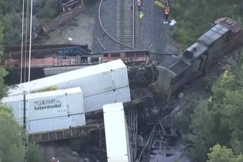 2 freight trains collided in Colorado, damaging a bridge, spilling fuel and injuring 2 crew