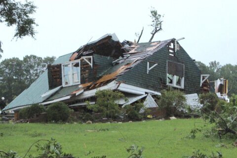 The Latest: A downgraded Debby still threatens the East Coast with heavy rain and flooding