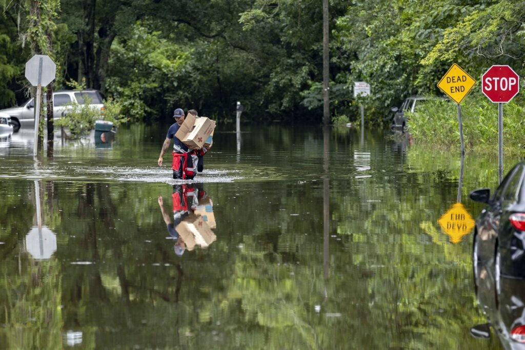 Tropical Storm Debby swirls over Atlantic, still dumping rain on the Carolinas before moving north