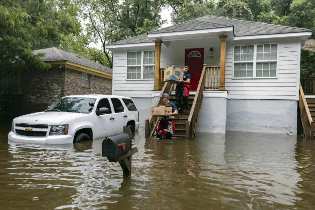 The Latest: Tropical Storm Debby lingering over Georgia and the Carolinas