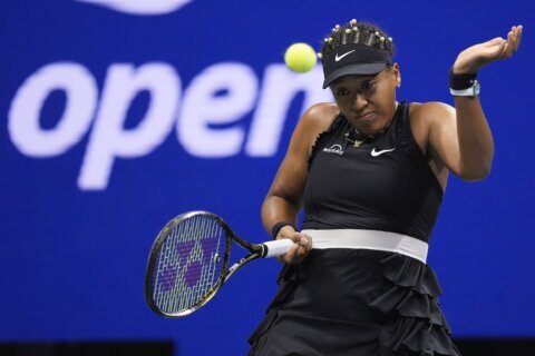 Naomi Osaka's forehand goes awry and she loses in the US Open's second round to Karolina Muchova