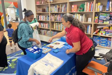 Families in Alexandria, Virginia, attend this year's health fair ahead of the new school year on August 15, 2024. 