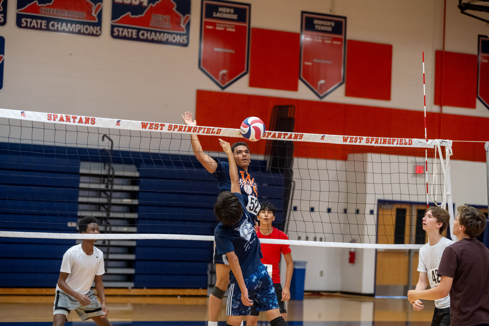 students at west springfield high tryout for the boys varsity volleyball team