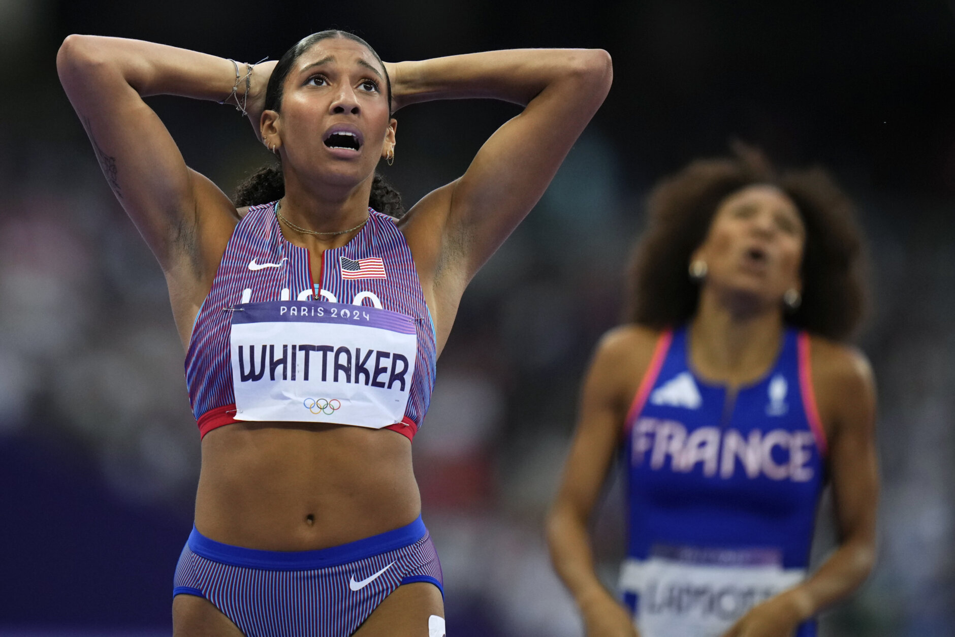 Juliette Whittaker, of the United States, reacts after a women's 800-meter semifinal at the 2024 Summer Olympics, Sunday, Aug. 4, 2024, in Saint-Denis, France.