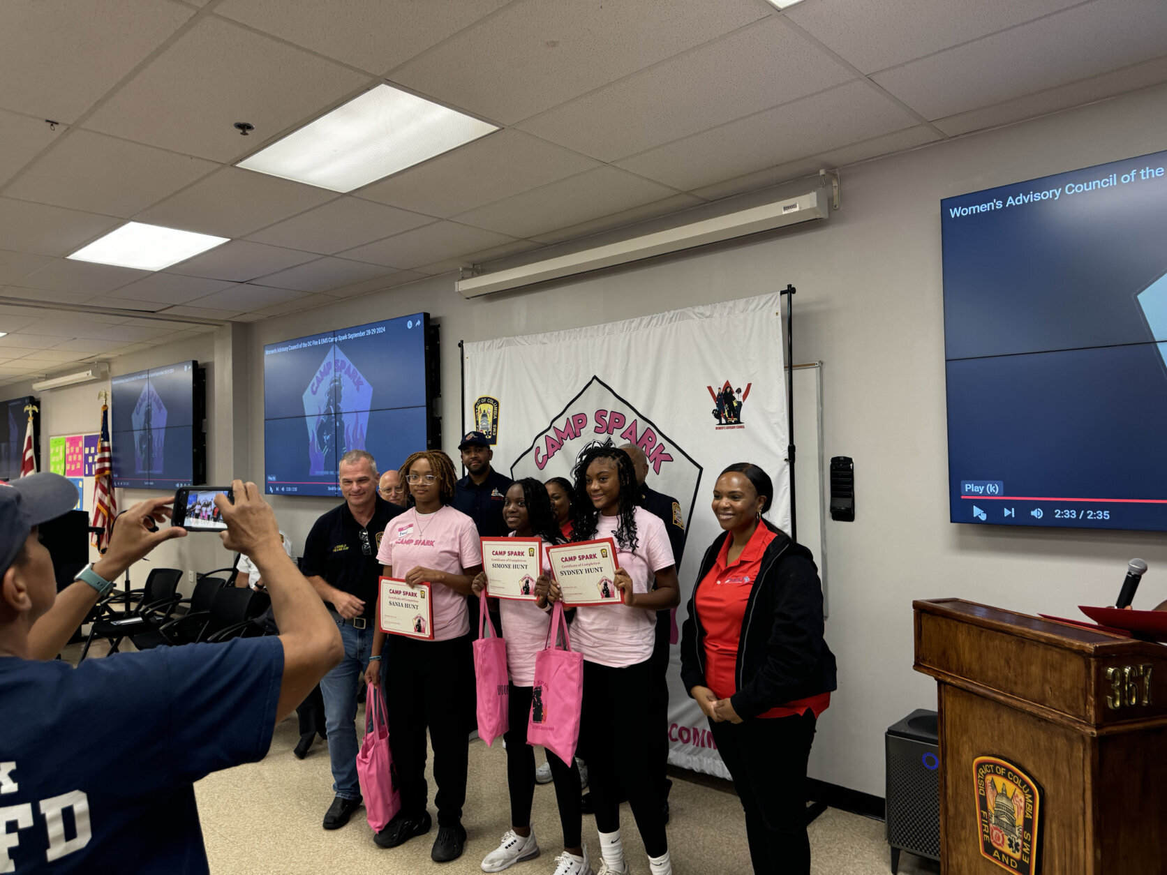 Girls smiling with certificates