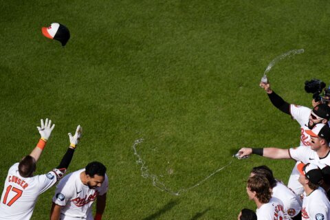 An AP photographer catches an Orioles celebration from high above the action