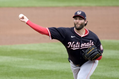 Cubs stave off elimination, beat Nationals 3-1 behind Taillon and Swanson