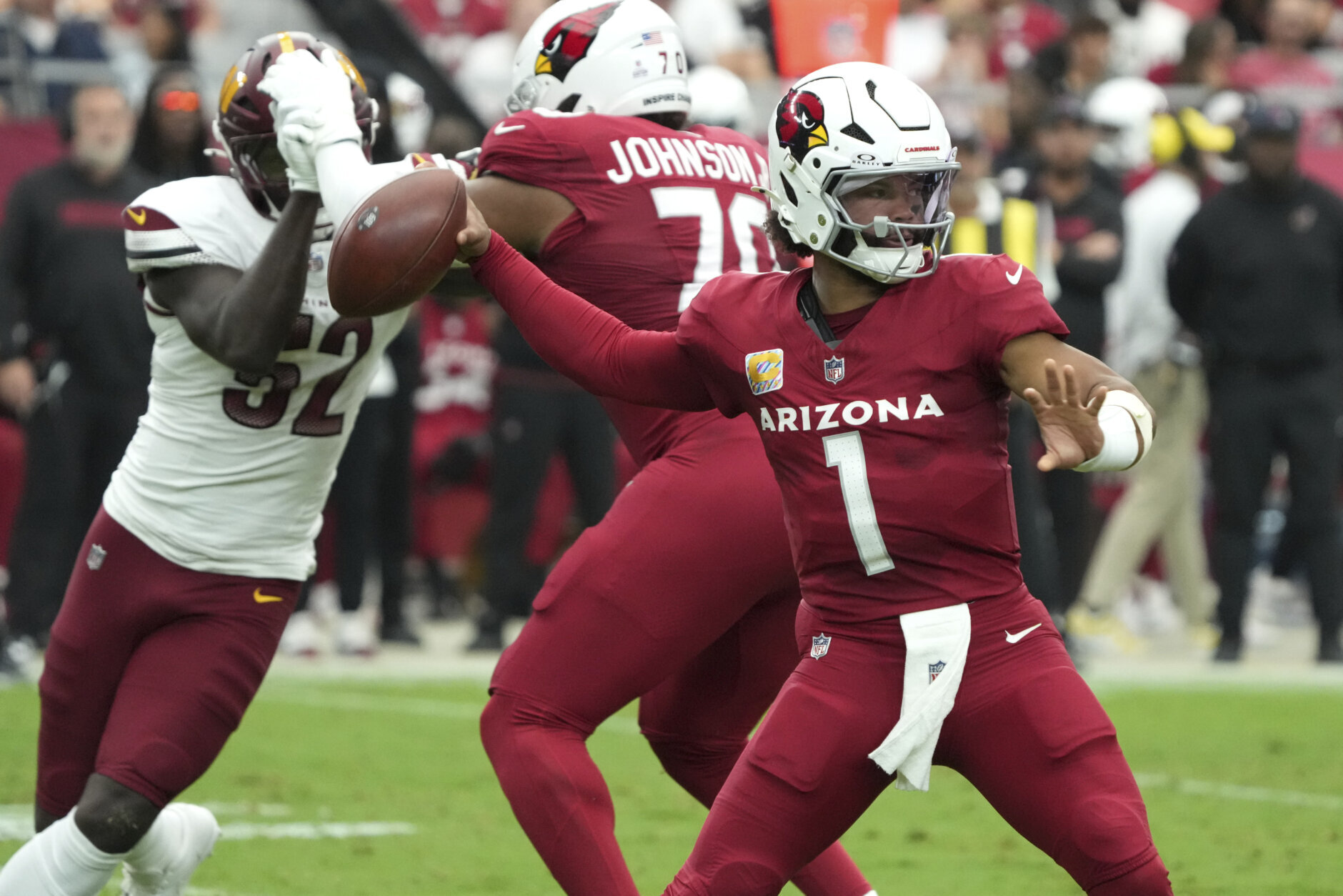 Arizona Cardinals quarterback Kyler Murray (1) throws against the Washington Commanders during the first half of an NFL football game, Sunday, Sept. 29, 2024, in Glendale, Ariz. (AP Photo/Rick Scuteri)