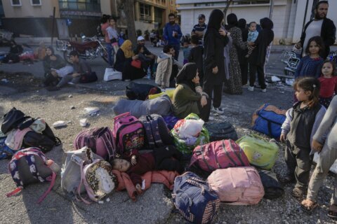 Hundreds of fleeing families sleep on beaches and streets after Israel's strikes shake Beirut