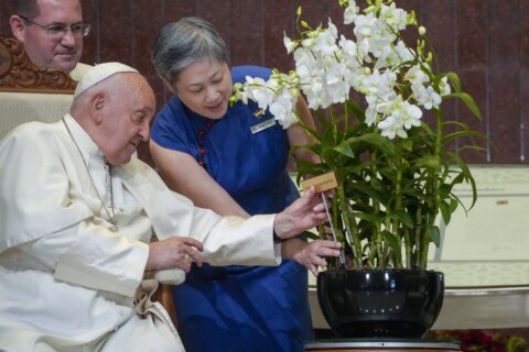 Pope marvels at Singapore’s skyscrapers and asks that the lowest migrant workers not be forgotten