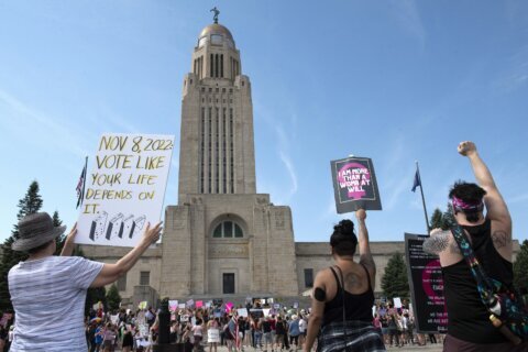 Nebraska ballot can include competing measures to expand or limit abortion rights, high court rules