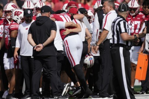 Wisconsin QB Tyler Van Dyke is knocked out of game with Alabama on the opening series