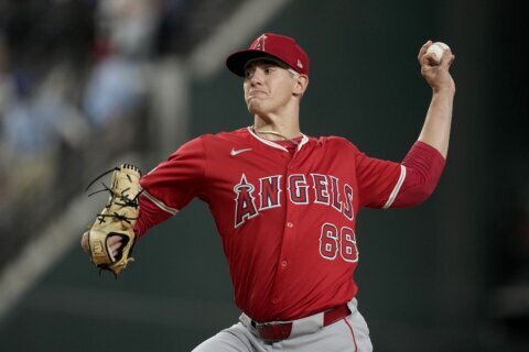 Italian rookie Sam Aldegheri gets 1st major league victory, helping the Angels beat the Rangers 5-1