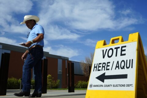 Early in-person voting begins in Arizona, drawing visits from Harris and Trump