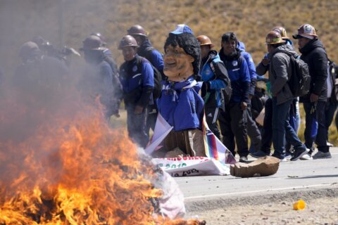 March for Bolivia's ex-President Morales turns violent, as political crisis escalates