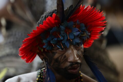 Brazil Indigenous group hails a sacred cloak’s homecoming after centuries in Europe