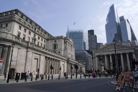 Bank of England keeps its main interest rate on hold at 5% in wake of big US Fed rate cut