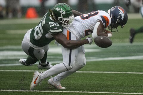 Broncos running back Tyler Badie carted from sideline with a back injury